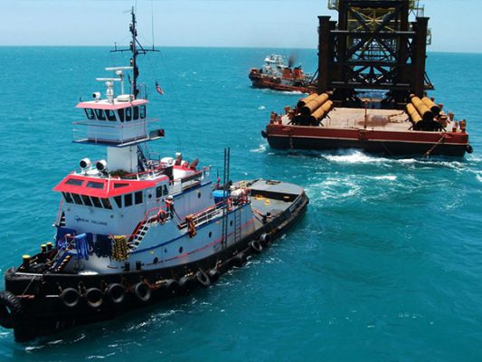 tug-boat-pulling-barge-california